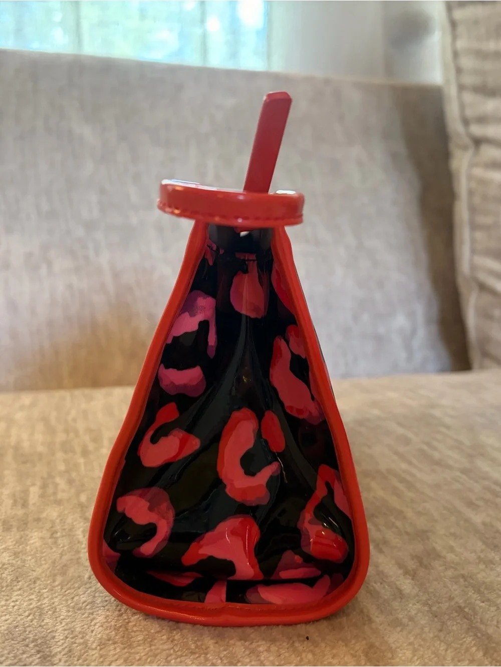 kate spade Black Patent Clutch with Pink Leopard Print and Red Trim